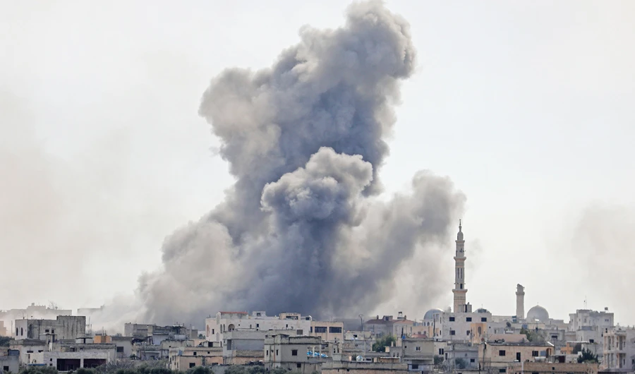 This picture taken on Monday shows smoke plumes billowing in the Syrian village of Al-Nayrab during bombardment by Syrian government forces and its allies. (AFP)