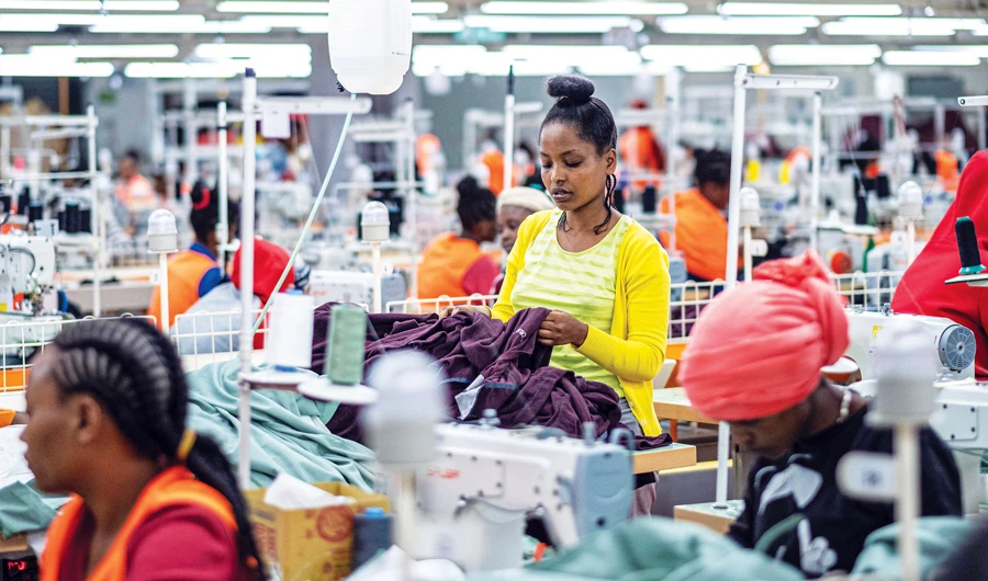 Workers operate sewing machines at a garment factory at the Hawassa Industrial Park in southern Ethiopia. (AFP)