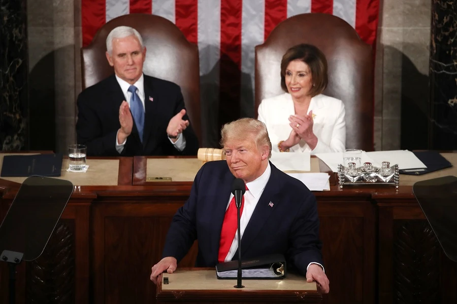 On eve of expected acquittal, Trump scorns Democrats, touts economy