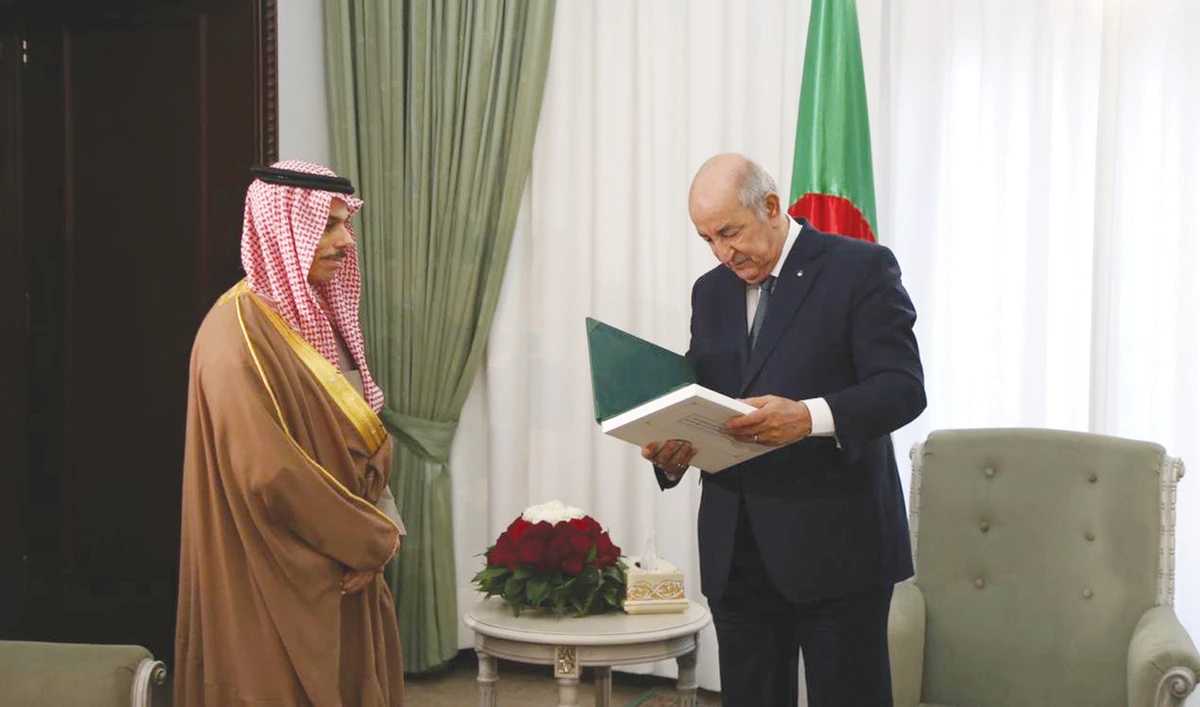 Algerian President Abdul Majeed Tabun welcomes Saudi Minister of Foreign Affairs Prince Faisal bin Farhan in Algiers. (SPA)
