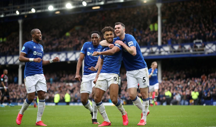 Everton's Dominic Calvert-Lewin celebrates scoring their third goal with Djibril Sidibe, Michael Keane and Yerry Mina. (Reuters)