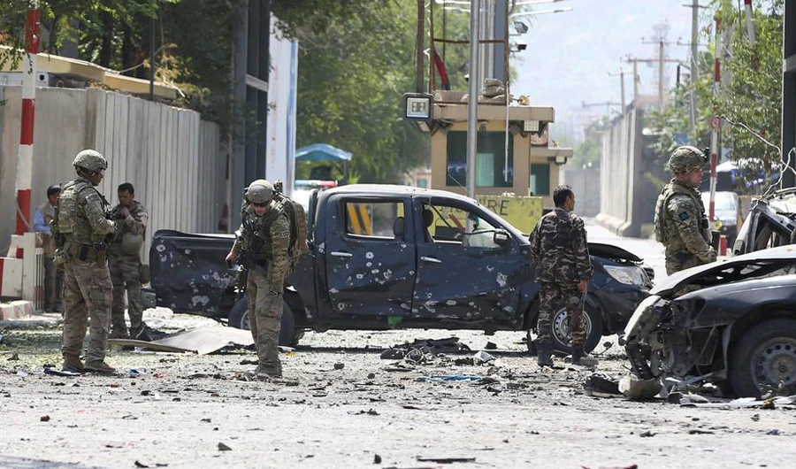 In this file photo, US troops investigate at the site of an attack in Kabul, Afghanistan on September 5, 2019. (Reuters)