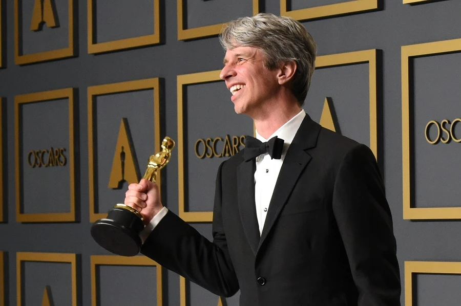 US director Marshall Curry poses in the press room with the Oscar for Best Live Action Short Film. (AFP)