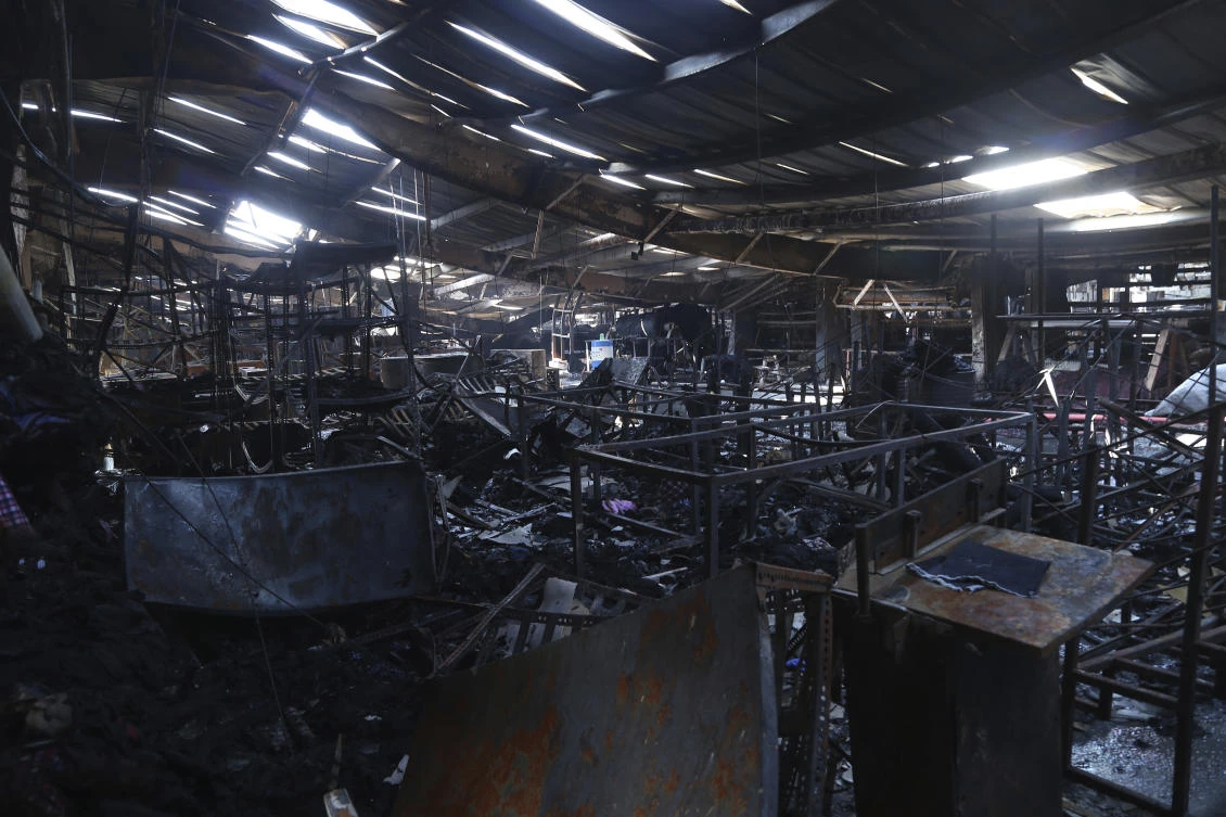 Lone door led out as fire burned Indian factory of US denim