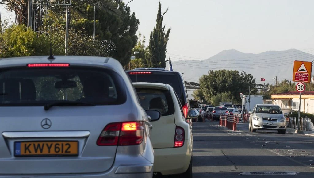 Cyprus law states that drivers must have both hands on the wheel. (AFP)