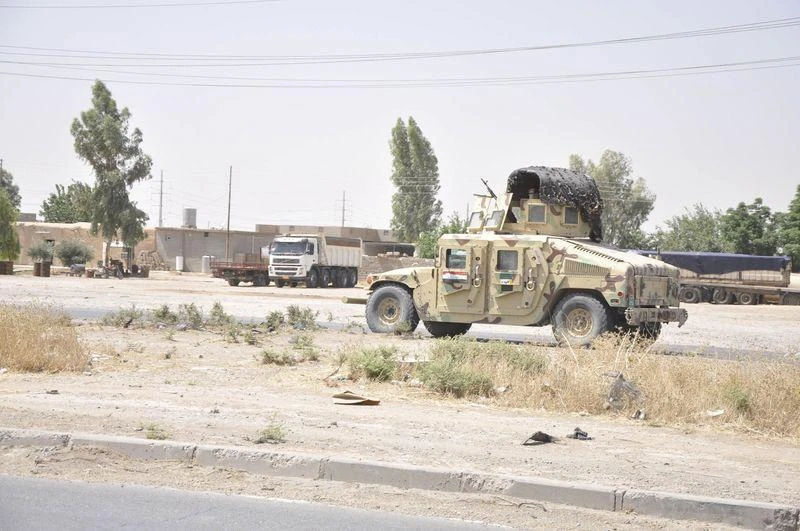 Iraqi security forces leave a military base as Kurdish forces take over control in Kirkuk June 11, 2014. (Reuters)