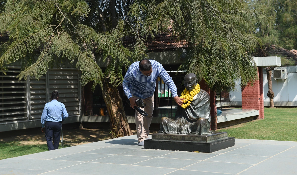 Gujarat police's bomb detection & disposal squad officials inspect Gandhi Ashram, one of the venues likely to be visited by US President Donald Trump and Indian Prime Minister Narendra Modi. (AFP)