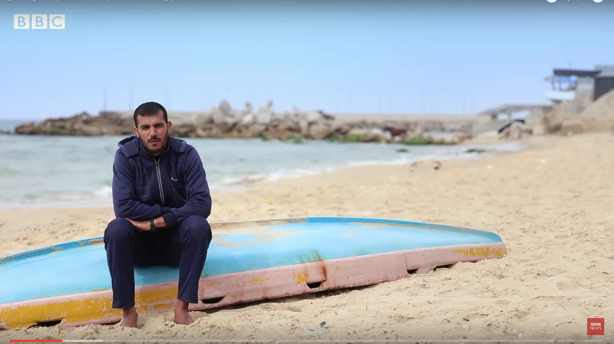 Abu Ahmed, one of those who discovered the coins on the seabed just off the coast of Blakhiya, Gaza, tells the filmmakers he sold 10 of the Alexander decadrachms to local dealers. (YouTube)