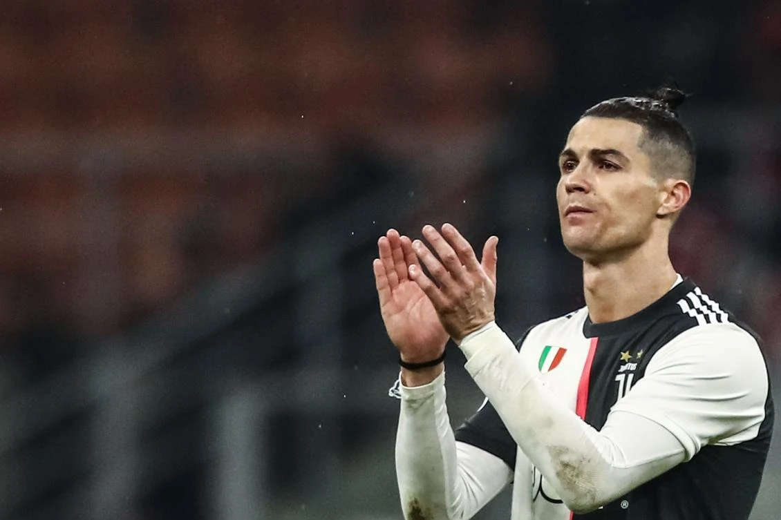 Ronaldo acknowledges the public at the end of the Italian Cup semi-final first leg football match AC Milan vs Juventus Turin on Feb. 13, 2020 at the San Siro stadium in Milan. (AFP)