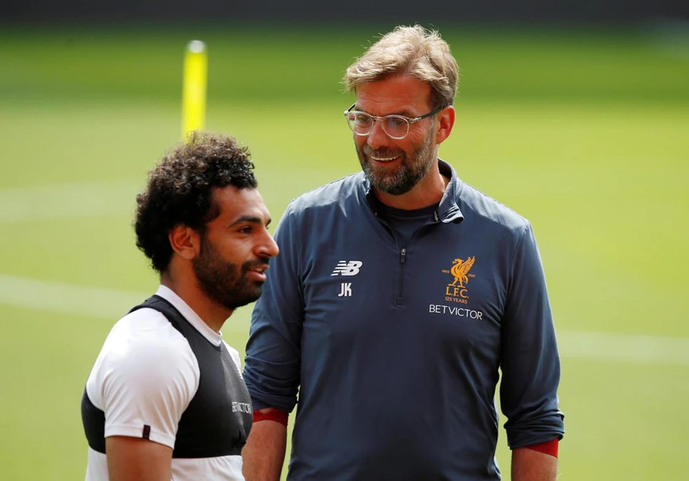 Liverpool manager Jurgen Klopp and Mohamed Salah during training. (Reuters)