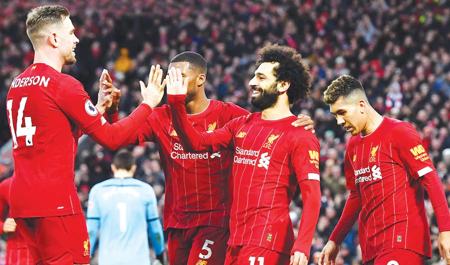 Liverpool players celebrate their victory over Southampton. The first-ever Premier League mid-season break has pleased the club’s coach Jurgen Klopp. (AFP/File)