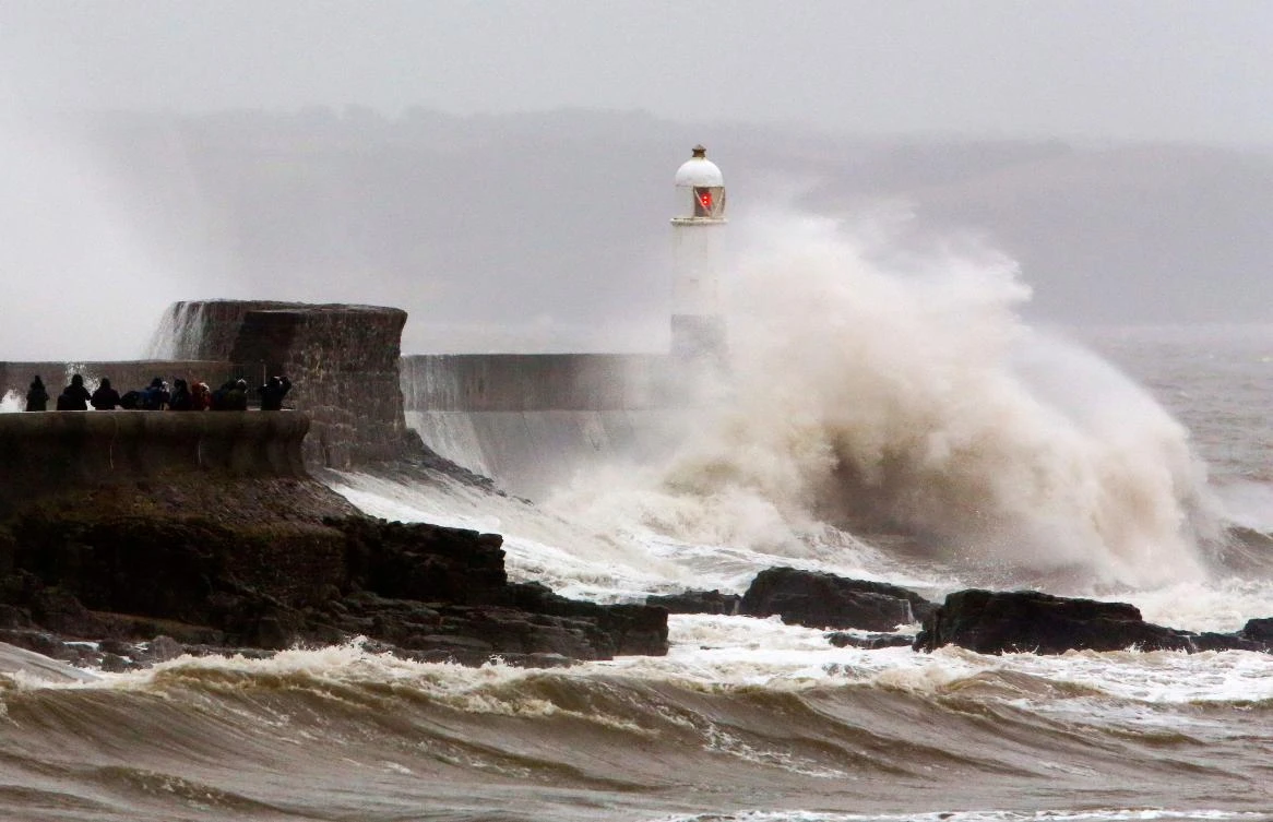 Huge waves crash against the sea wall at Porthcawl, south Wales as Storm Dennis hits the country on February 15, 2020. (AFP)