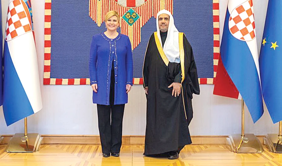 MWL Secretary-General Dr. Mohammed bin Abdulkarim Al-Issa meets Croatian President Kolinda Grabar-Kitarovic in Zagreb on Saturday. (SPA)