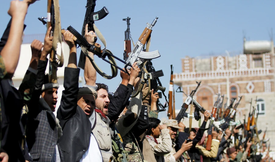 Tribesmen loyal to the Houthi movement hold their weapons as they attend a gathering in Sanaa, Yemen December 21, 2017. (REUTERS)