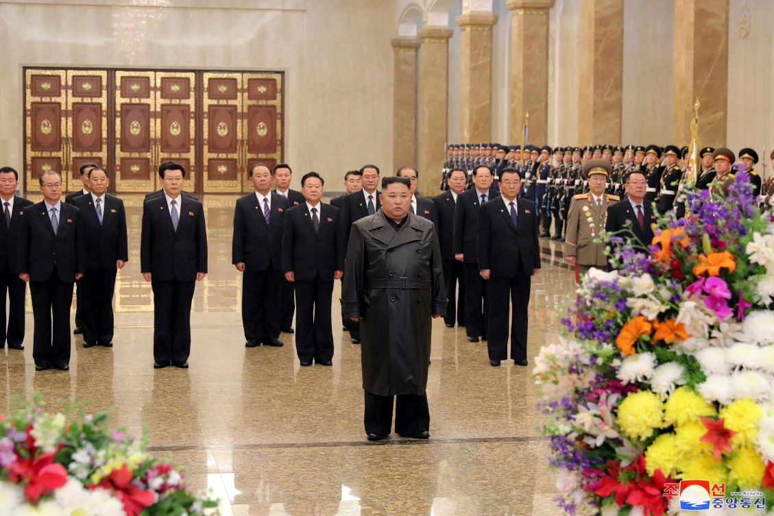 Kim Jong Un paid tribute to the statue of his father Kim Jong Il at Pyongyang’s Kumsusan Palace of the Sun, accompanies by high ranking party officials. (KCNA via Reuters)