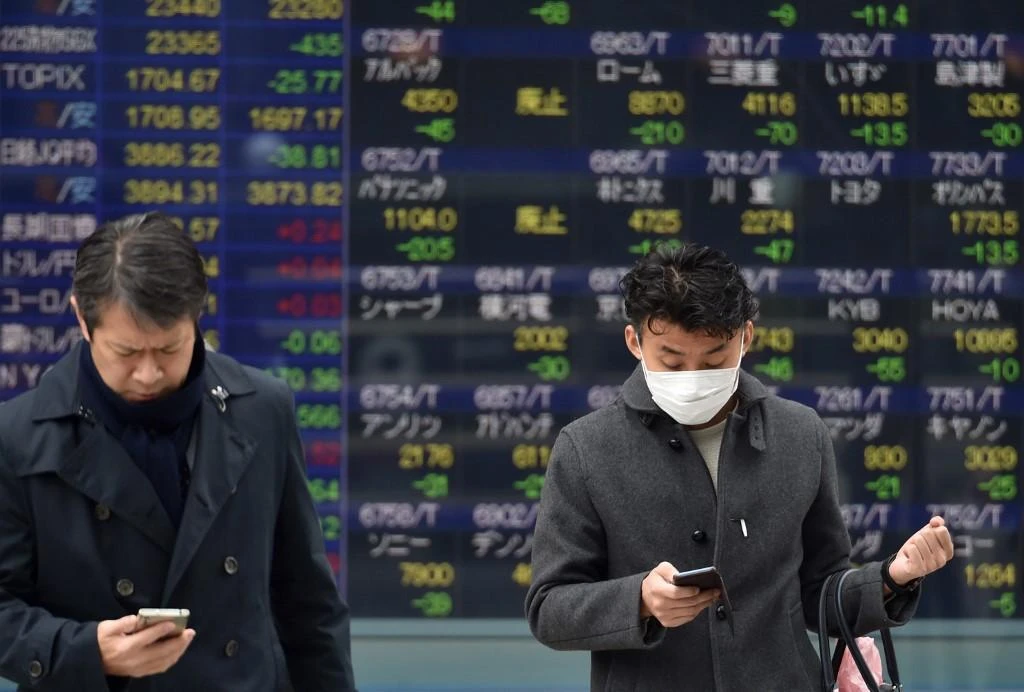 Economists are now carefully watching to see what impact the new virus will have on the world’s third-largest economy, as it hits Japanese companies’ manufacturing activities and tourism. (AFP)
