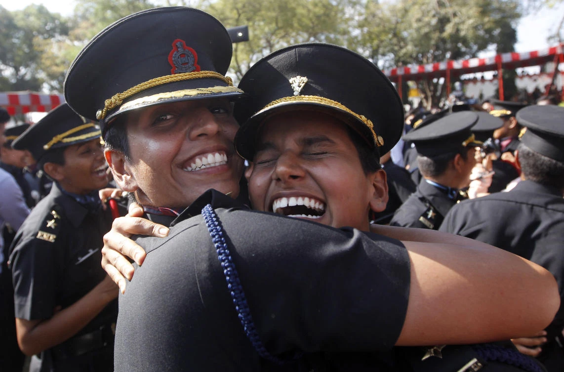 Women cadets celebrate after their graduation ceremony at the Indian Army’s Officers Training Academy in Chennai, India in this March 14, 2015 file photo. (AP)