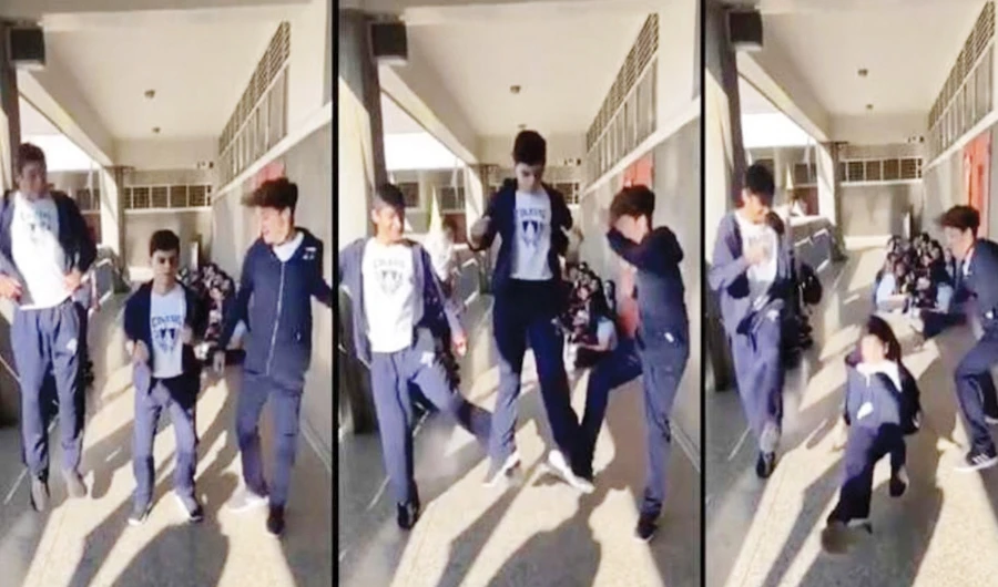 The trend, popularized on the video-sharing app TikTok, involves three participants standing side by side with the outside two filmed kicking the third’s feet out from under them while they all jump in the air. (Photo/Social media)