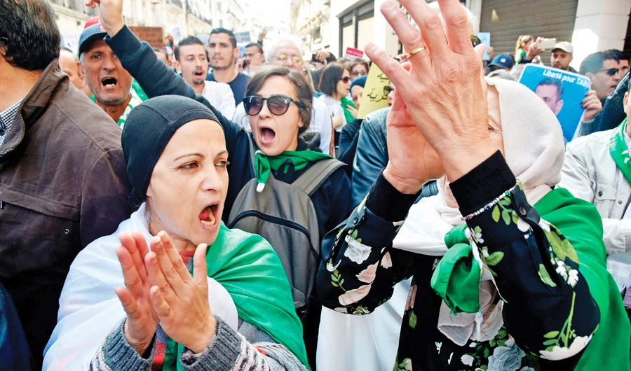 Algerian women take part in an anti-government protest rally in Algiers. (AFP)