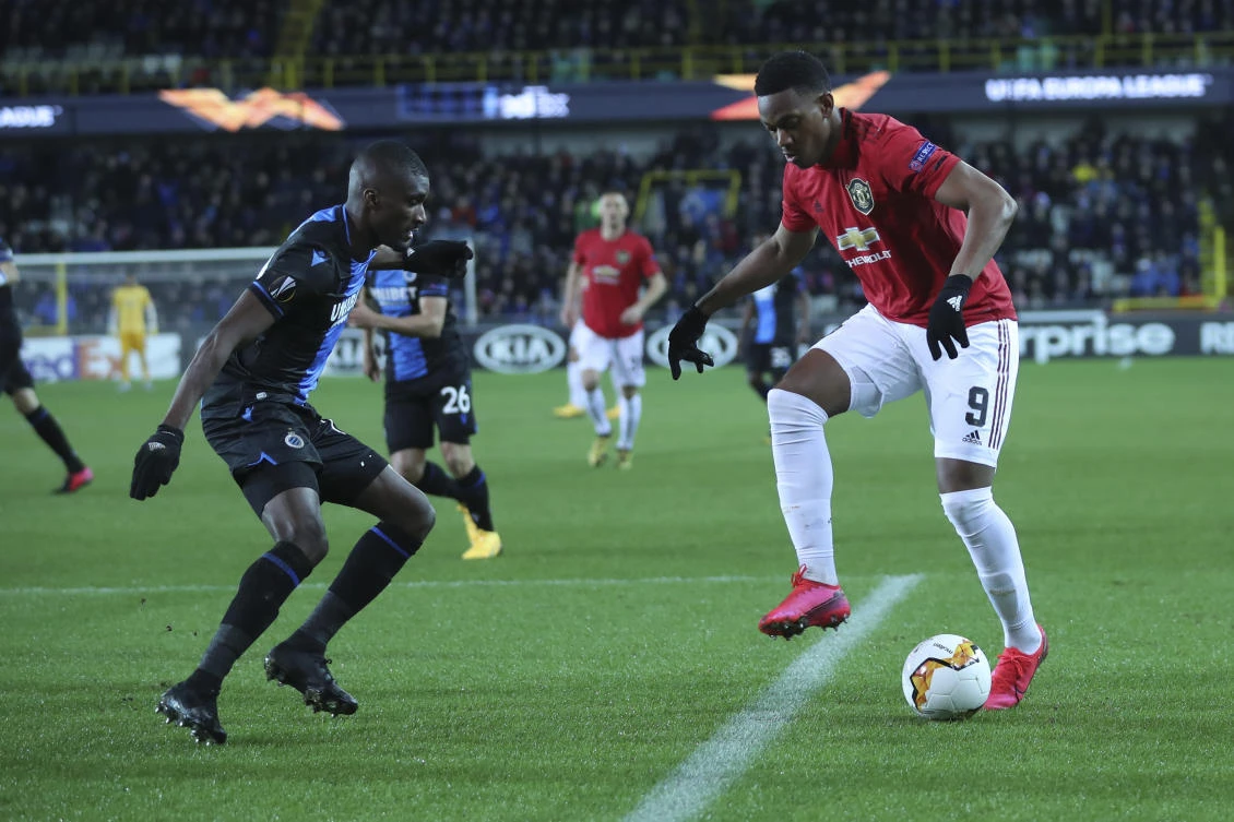 Martial grabs key goal as Man Utd draw in Bruges