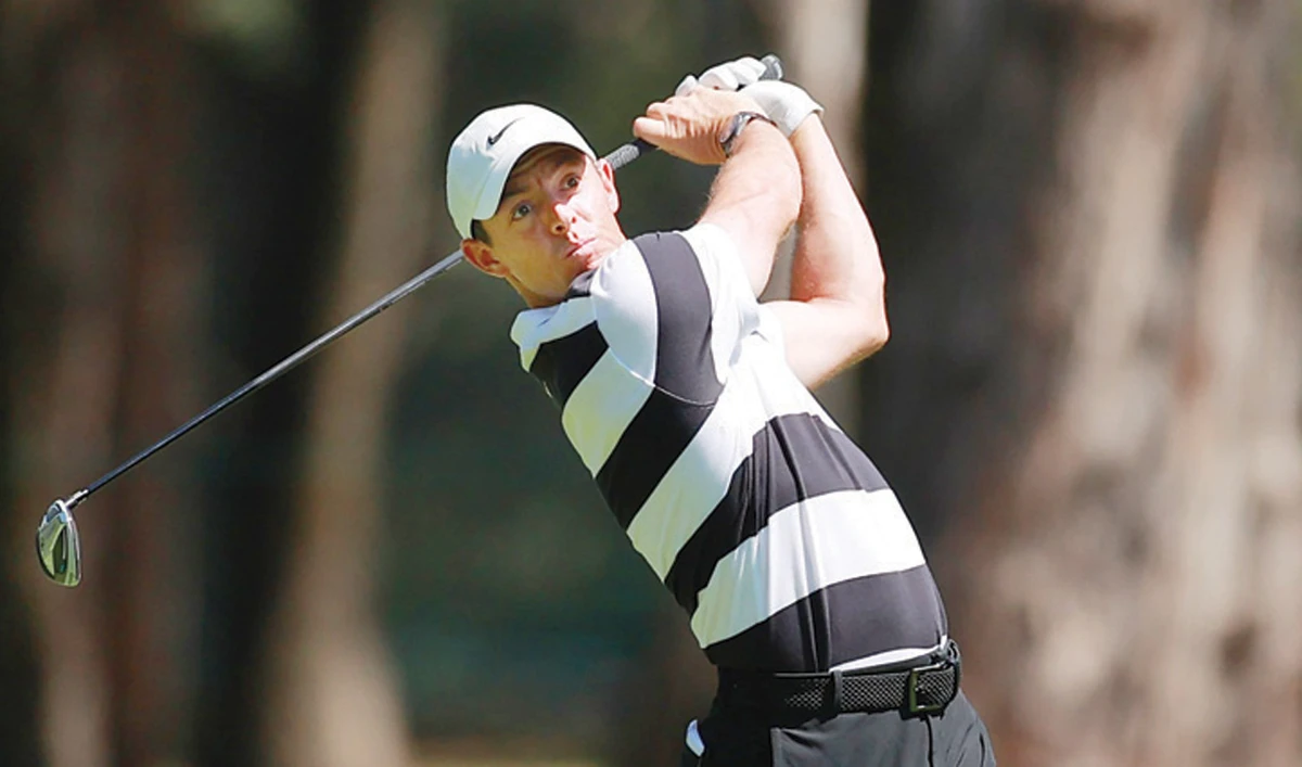 Rory McIlroy plays a shot on the 6th hole ahead of World Golf Championships-Mexico Championship in Mexico City. (AFP)