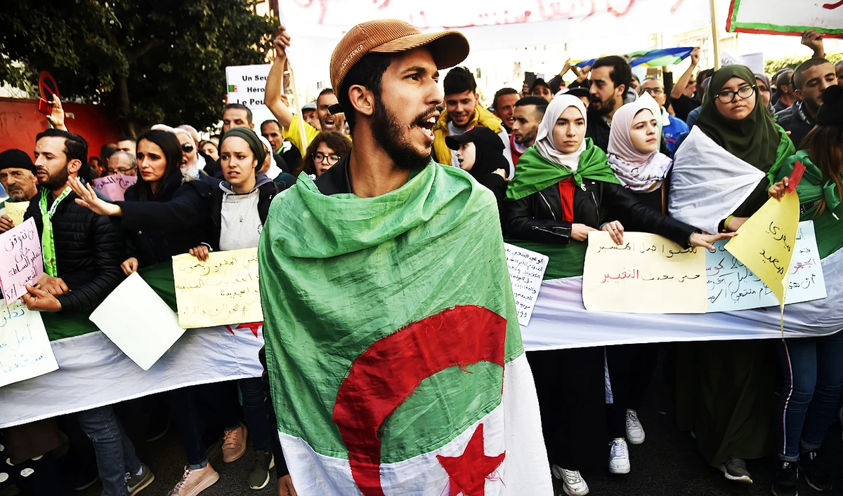 Algerian students take part in an anti-government protest in Algiers. Anti-government protesters were back on the street for the 56th consecutive day. (AFP)