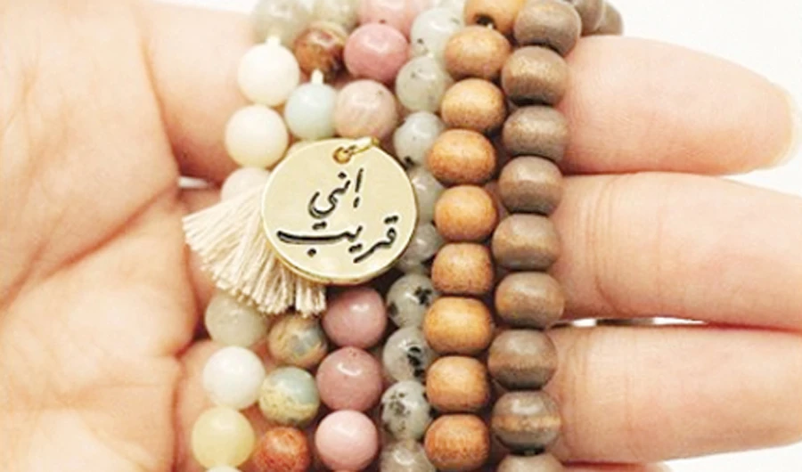 Top-selling items include “Subhas” (prayer beads) made with semi-precious stones, gold-plated ring sets, names of Allah keychains and bracelets.