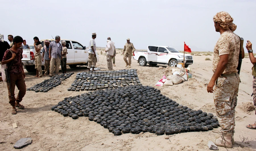 Members of a Yemeni military demining unit prepare to destroy unexploded bombs and mines collected from conflict areas near the southern port city of Aden, Yemen August 1, 2017. (REUTERS)