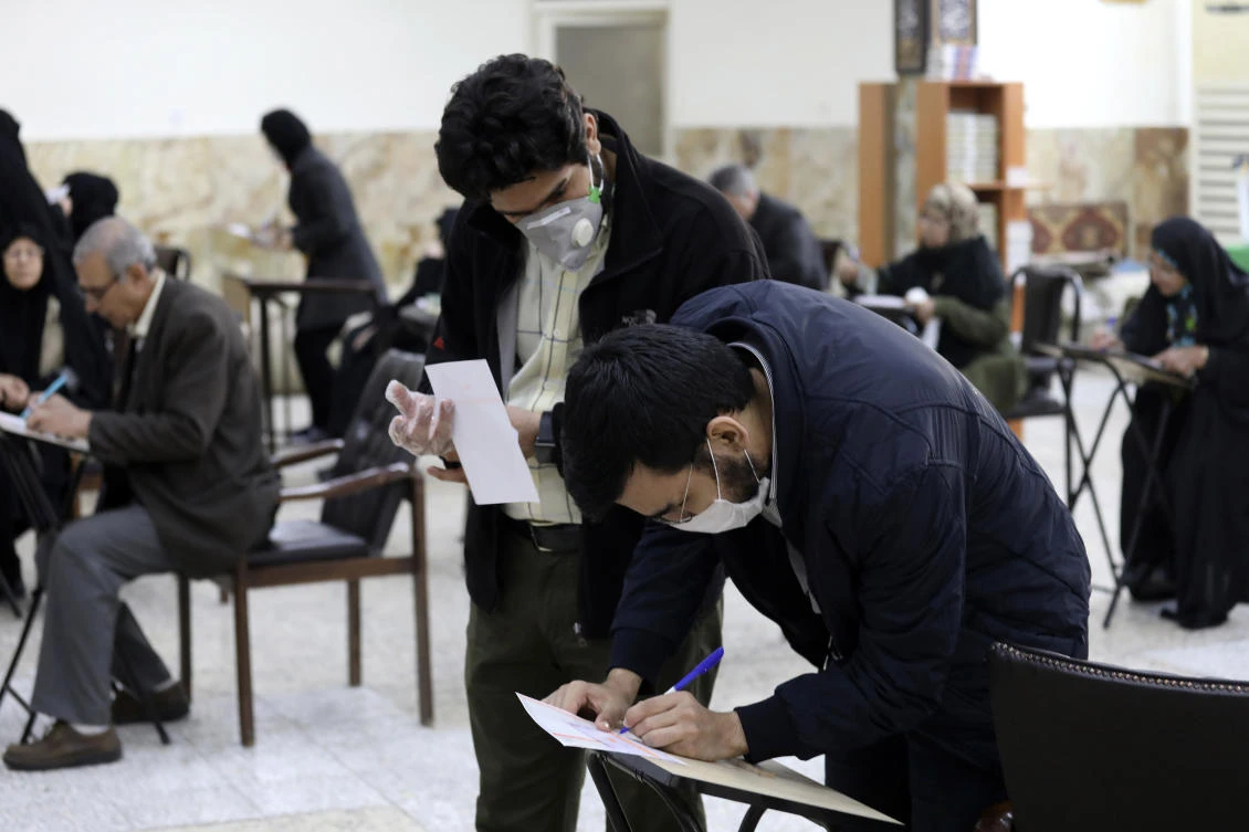 Iranian voters had limited options on Friday’s ballot, as more than 7,000 potential candidates had been disqualified, most of them reformists and moderates. (AP)