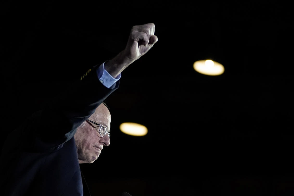 Democratic presidential candidate Sen. Bernie Sanders (I-VT) raises his fist as he arrives onstage after winning the Nevada caucuses during a campaign rally at Cowboys Dancehall. (File/Drew Angerer/Getty Images North America /AFP)