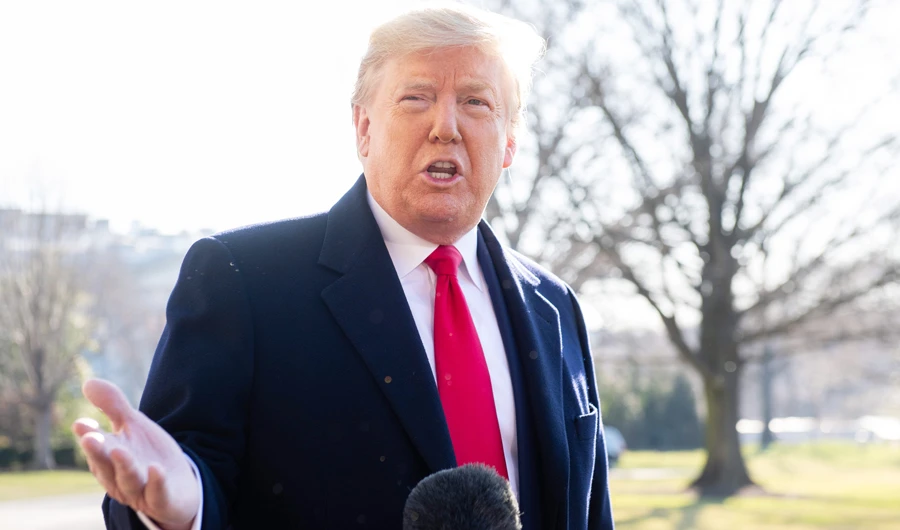 US President Donald Trump speaks to the press prior to departing on Marine One from the South Lawn of the White House in Washington, DC, February 23, 2020, leaving on a 2-day trip to India. (AFP)