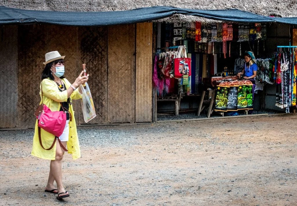 Asia’s main tourism hotspots have suffered thousands of cancellations, even as countries impose travel restrictions to try and halt the spread the virus. (AFP)