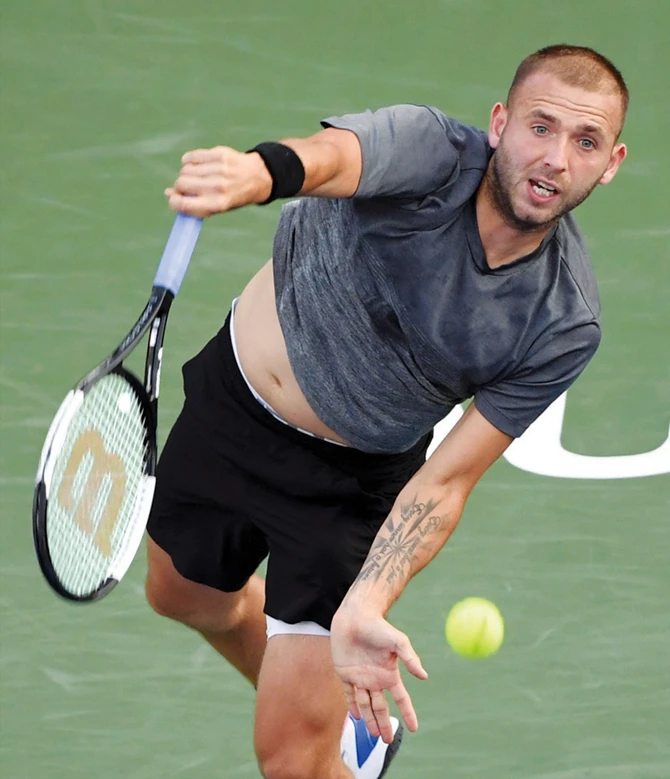 Paire hangs on to beat Cilic, Fognini shocked by Evans