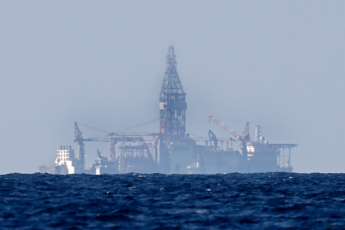 The drilling ship Tungsten Explorer is seen off the coast of Beirut, Lebanon, on Feb. 26, 2020. The vessel is scheduled to start later this week the first oil and gas exploration drills off the Lebanese coast. (AP Photo/Hussein Malla)
