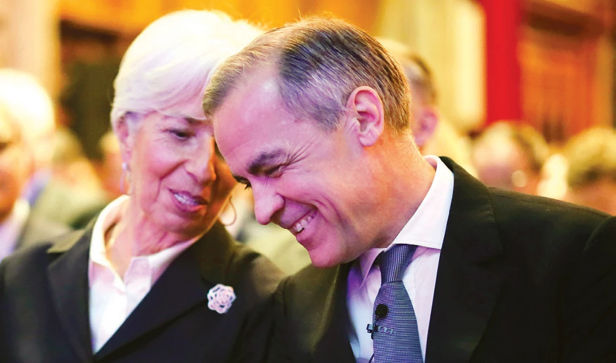 Outgoing Bank of England Gov. Mark Carney with European Central Bank President Christine Lagarde in London’s Guildhall on Thursday. (AP)