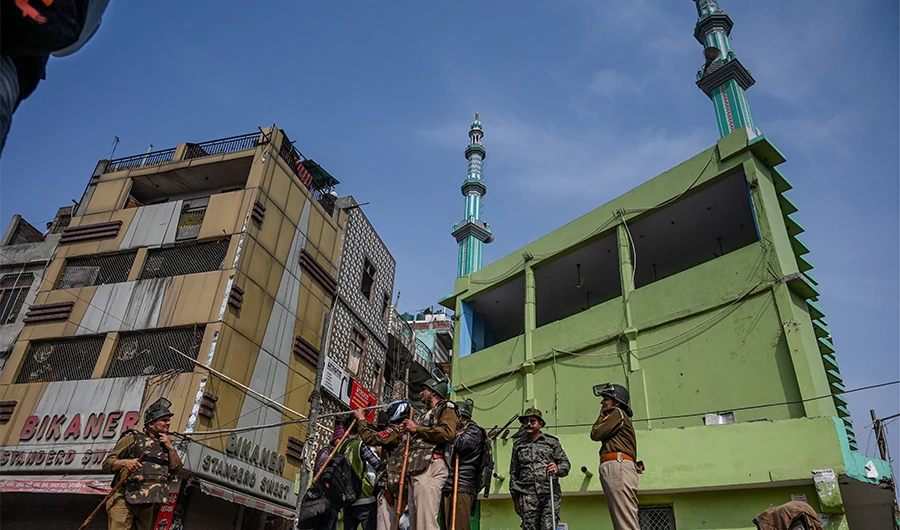 Prayers at fire-bombed mosques as India’s riot toll grows
