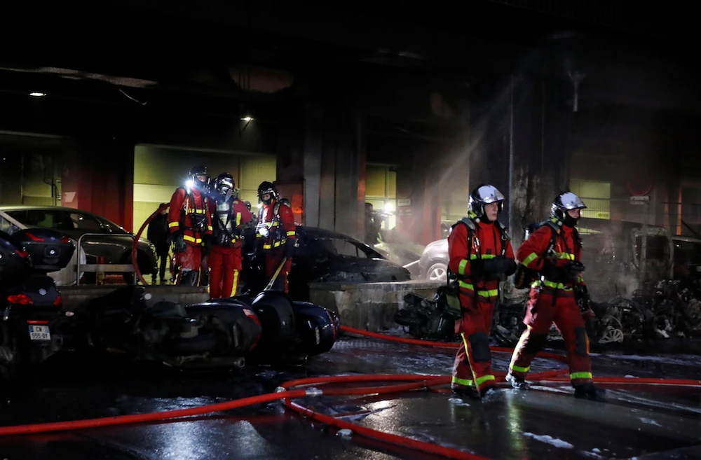 Fire fighters work at the scene of a fire near Gare de Lyon railway station in Paris, France, Feb. 28, 2020. (Reuters)