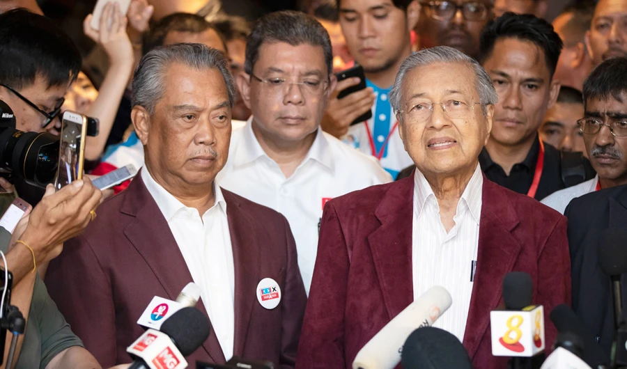 Berastu party said that 36 lawmakers, including nearly a dozen who defected from Anwar Ibrahim’s party, have decided to support party President Muhyiddin Yassin instead of Mahathir Mohamad as prime minister. (AP)