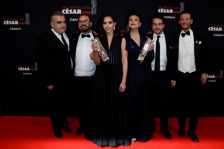The team behind ‘Papicha’ posed for photographs at the Cesars. (AFP)
