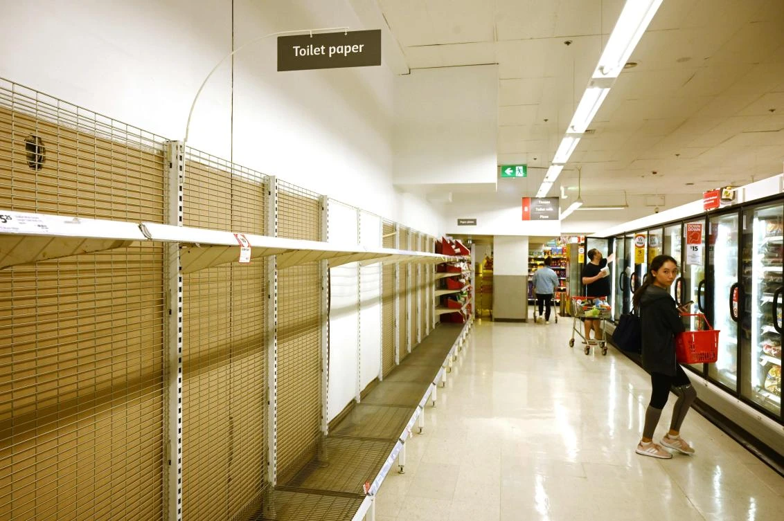 Shelves are empty of toilet rolls in a supermarket in Sydney after fears of the coronavirus sparked panic buying on March 4, 2020. (AFP)