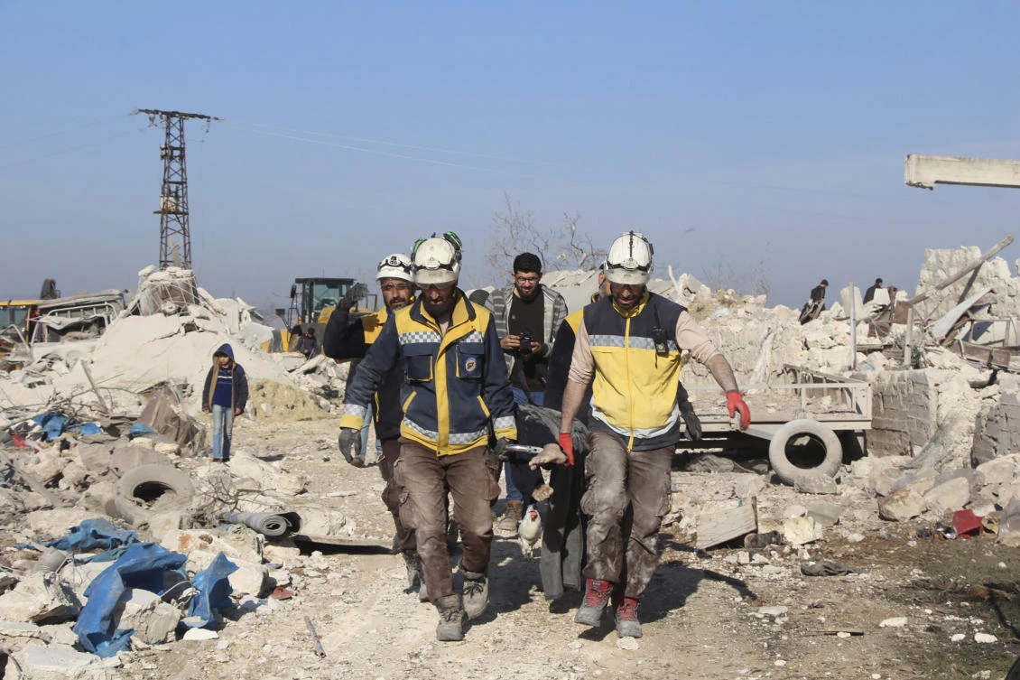 The fighting in Idlib — Syria’s last remaining rebel stronghold — has killed hundreds and displaced nearly a million people. (Syrian Civil Defense White Helmets via AP)