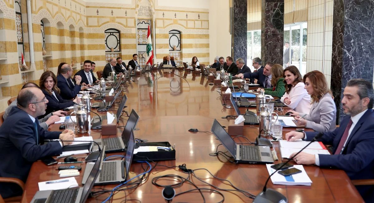 A handout picture provided by the Lebanese photo agency Dalati and Nohra shows Lebanon's President Michel Aoun (C) heading a ministerial council at the presidential palace in Baabda, east of the capital Beirut on March 7, 2020. (AFP)