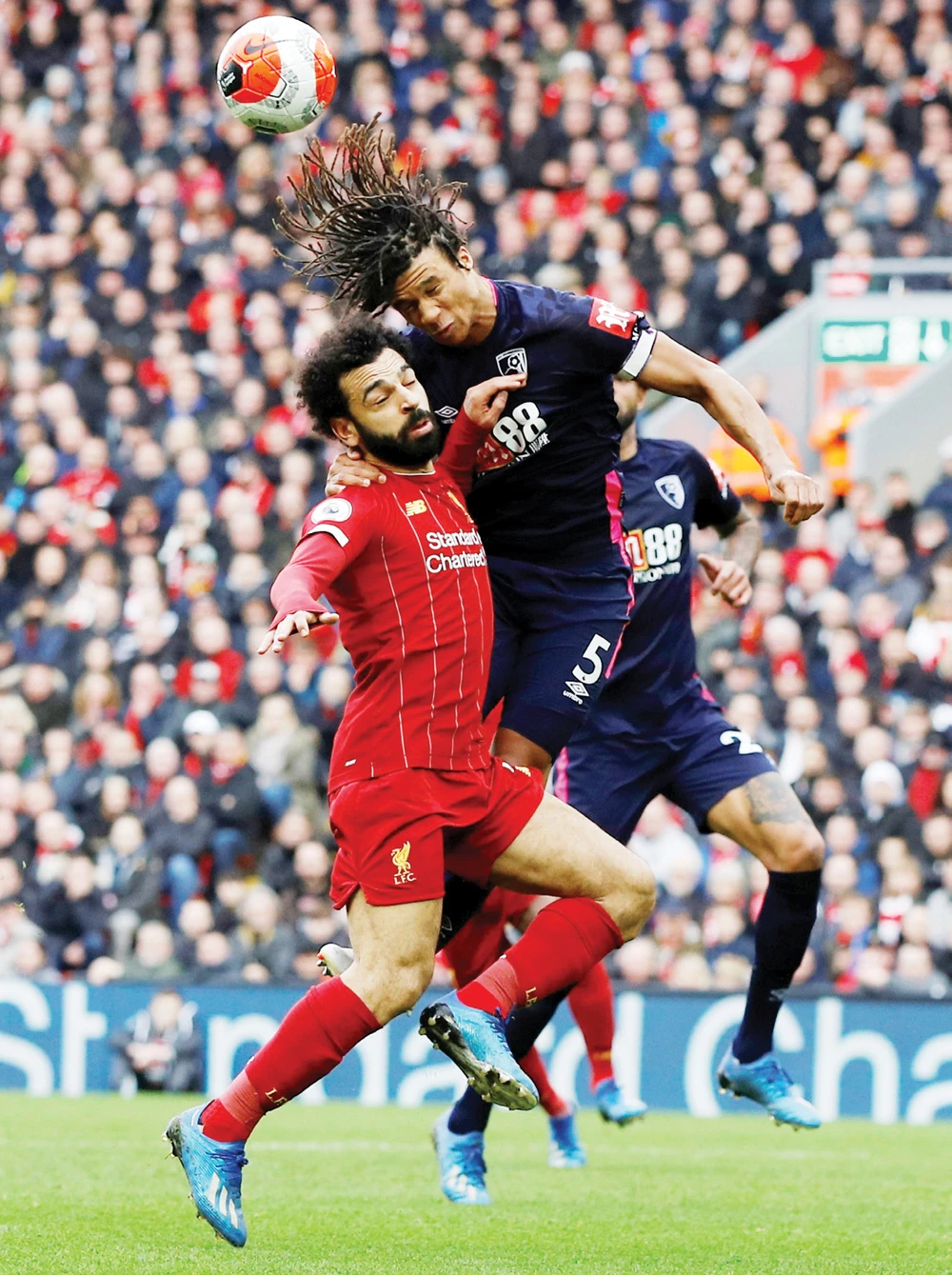 Bournemouth's Nathan Ake in action with Liverpool's Mohamed Salah during Saturday's Premier League match. (Reuters)