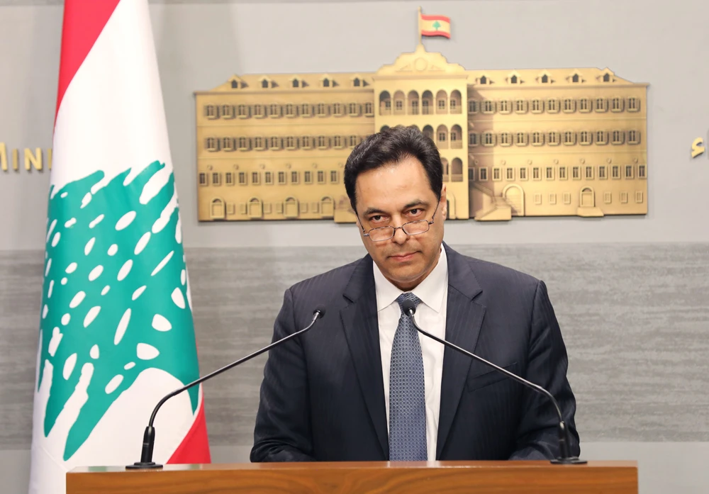 Lebanese Prime Minister Hassan Diab delivering a statement at the governmental palace in the capital Beirut. (AFP/ handout from Dalati and Nohra photo agency) )