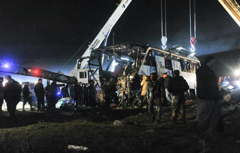 SANA released photos of a passenger bus with one end blown off. (AFP)