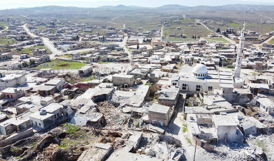 An aerial view shows destruction in the village of Kansafra in al-Zawiya Mountain region of Syria's northwestern province of Idlib on March 8, 2020. (AFP)