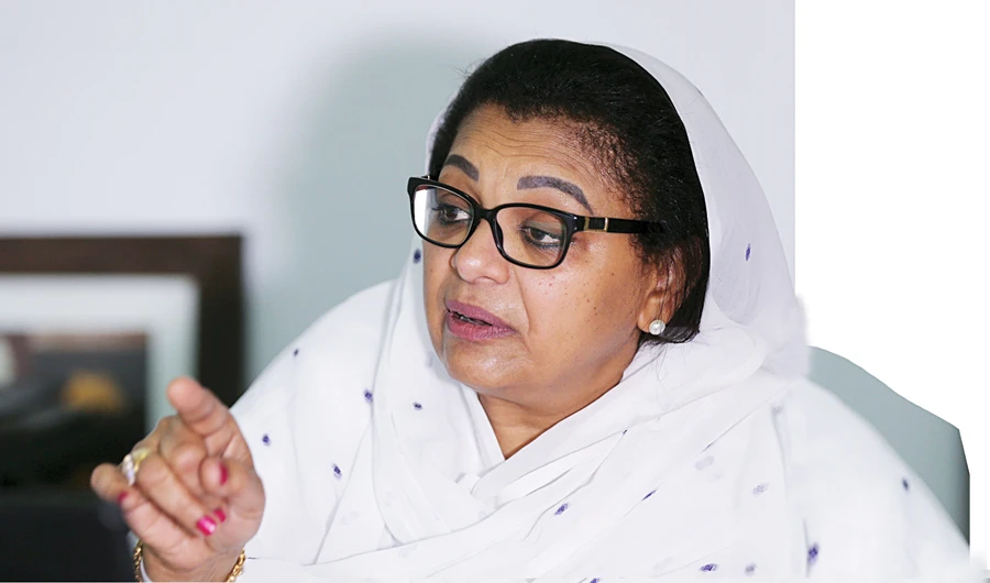 Sudanese lawyer and women’s rights activist Inaam Atiq talks to AFP during an interview at her office in Khartoum, on Saturday. (AFP)