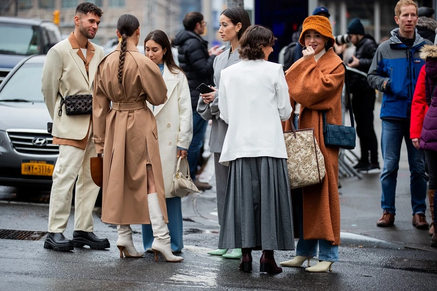 Group of guests seen outside Fashion Week. (Getty)