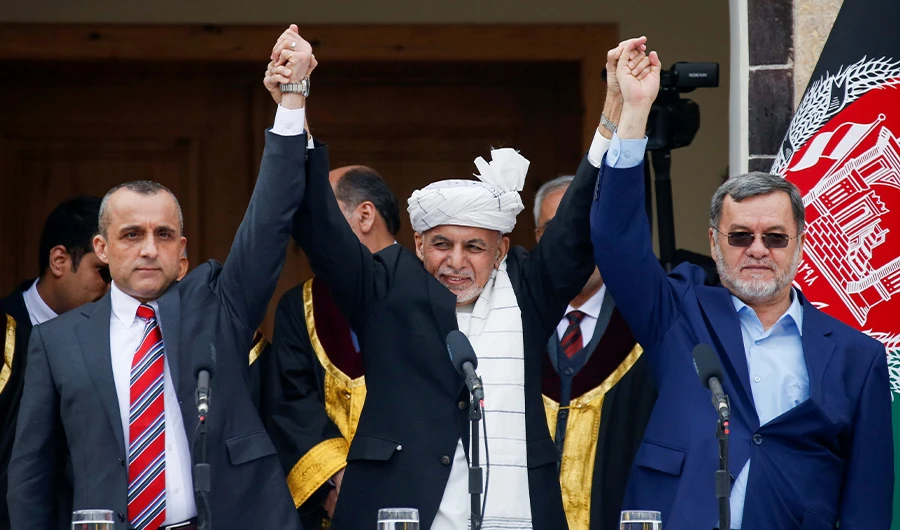 Afghanistan's President Ashraf Ghani (C), first Vice President Amrullah Saleh (L) and second Vice President Sarwar Danish (R) gesture during their swearing-in ceremony, in Kabul. (Reuters)