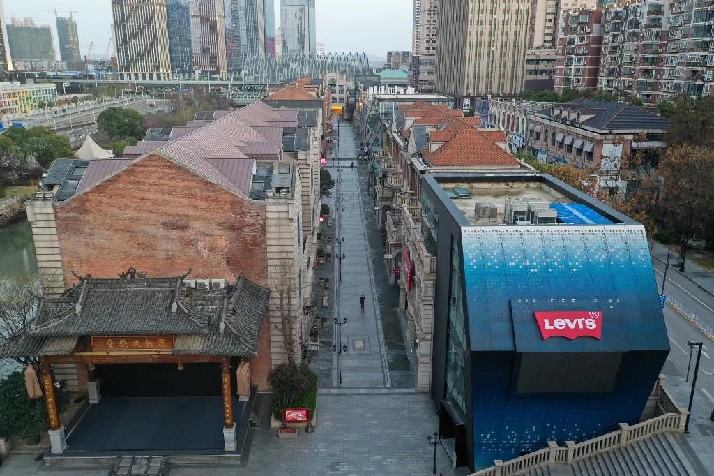 China allows some firms to resume work in Wuhan